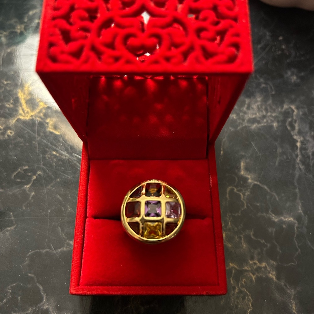 Elegant Gold Ring with Purple and Yellow Accents